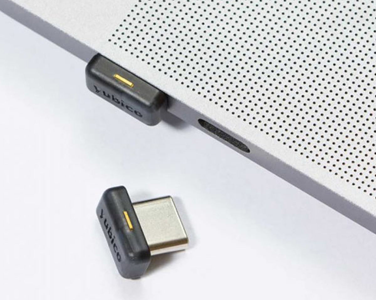 Yubico YubiKey 5C Nano compact USB-C security key connected to a laptop